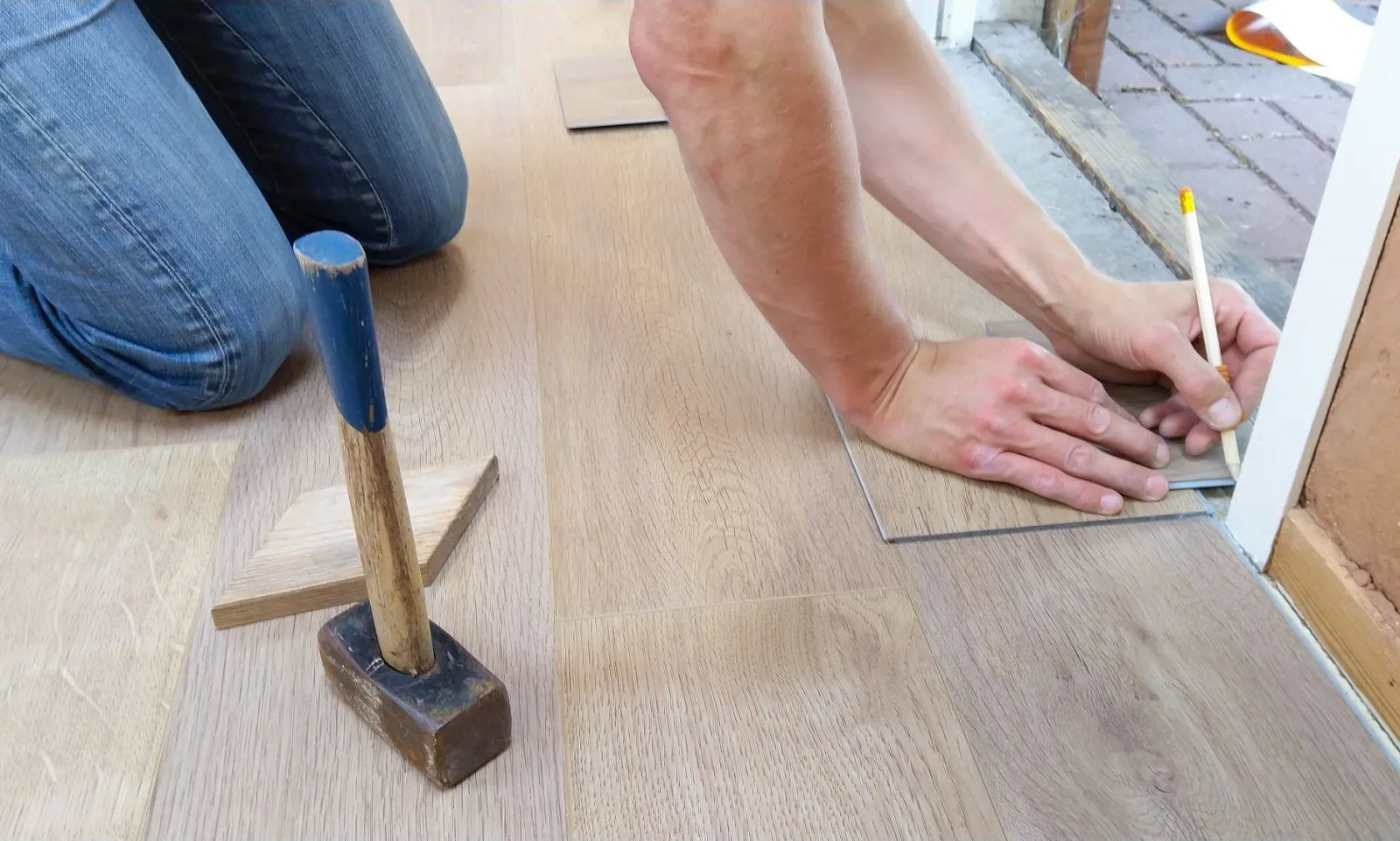 Man is working on Floor